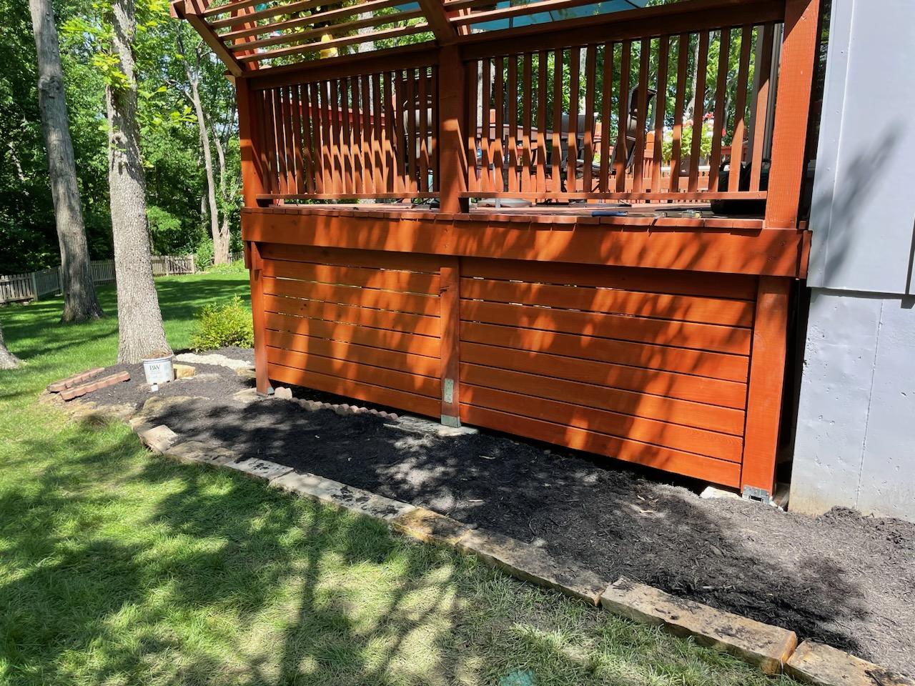 deck with landscape and mulch